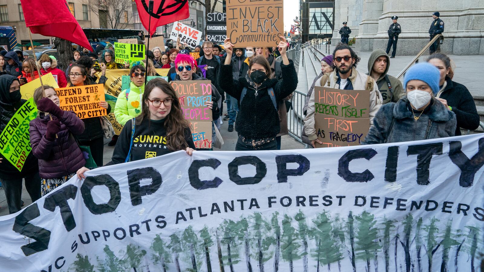 Protesters march against the construction of Cop City, a police training facility outside Atlanta, Georgia.