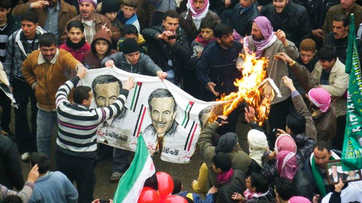 cheats/2012/01/10/syria-s-assad-promises-iron-fist/syria-protests-tease_of9v5g