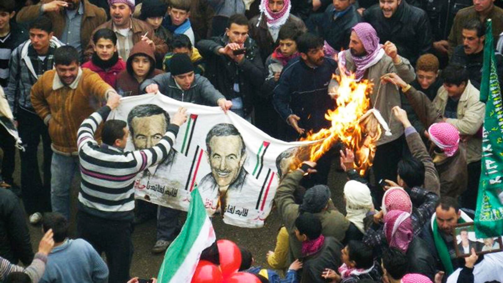 cheats/2012/01/10/syria-s-assad-promises-iron-fist/syria-protests-tease_of9v5g