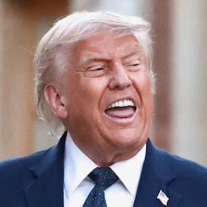 U.S. President Donald Trump is welcomed by French President Emmanuel Macron and his wife Brigitte Macron ahead of a dinner commemorating the 250th anniversary of the United States' independence, at the Palace of Versailles, near Paris, France, June 17, 2026.