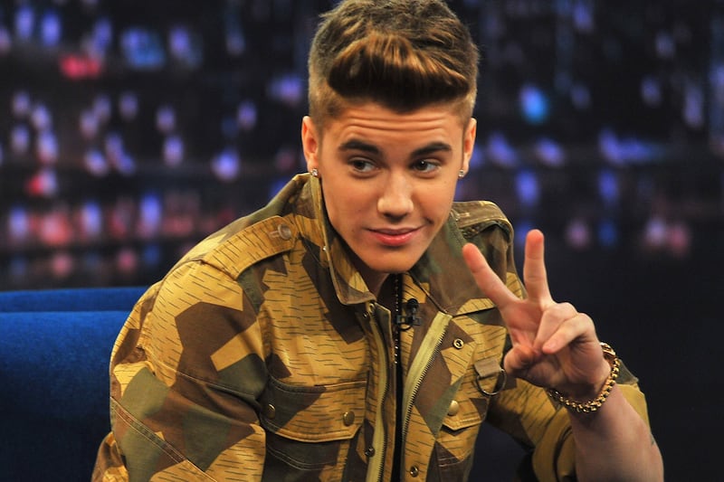 articles/2013/08/07/justin-bieber-brawled-over-h-m-bow-tie-kim-kardashian-rumored-to-design-children-s-clothes/130415-justin-bieber-anne-frank-cheat_gprqah