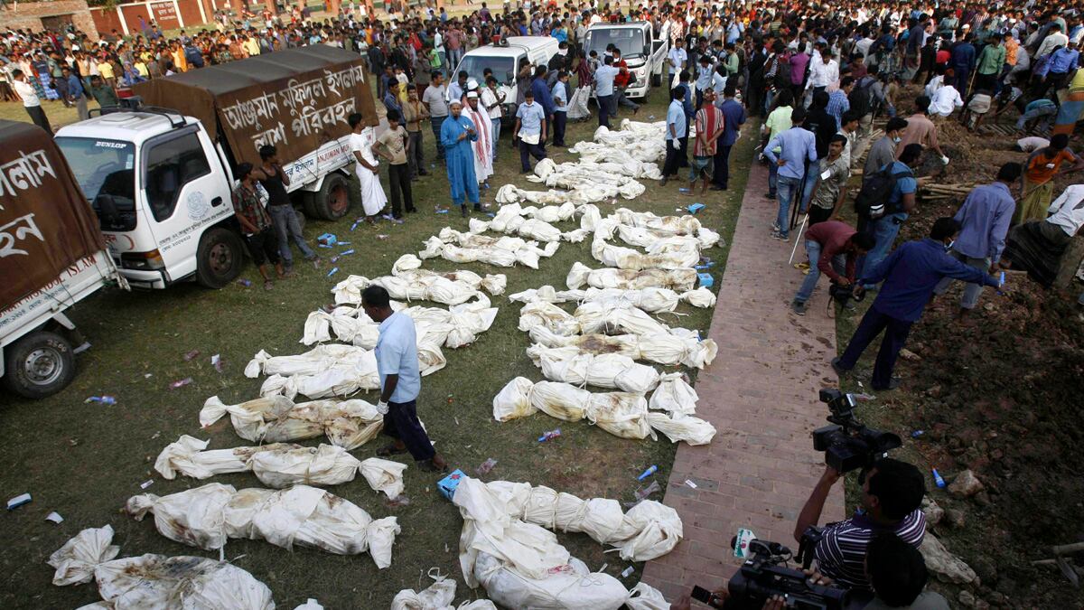 cheats/2012/11/29/three-arrested-in-bangladesh-fire/bangladesh-fire-exits-cheat_dx62j6