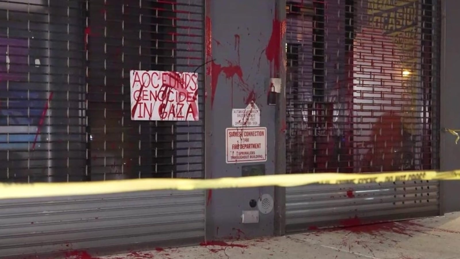AOC's campaign office vandalized with red paint.
