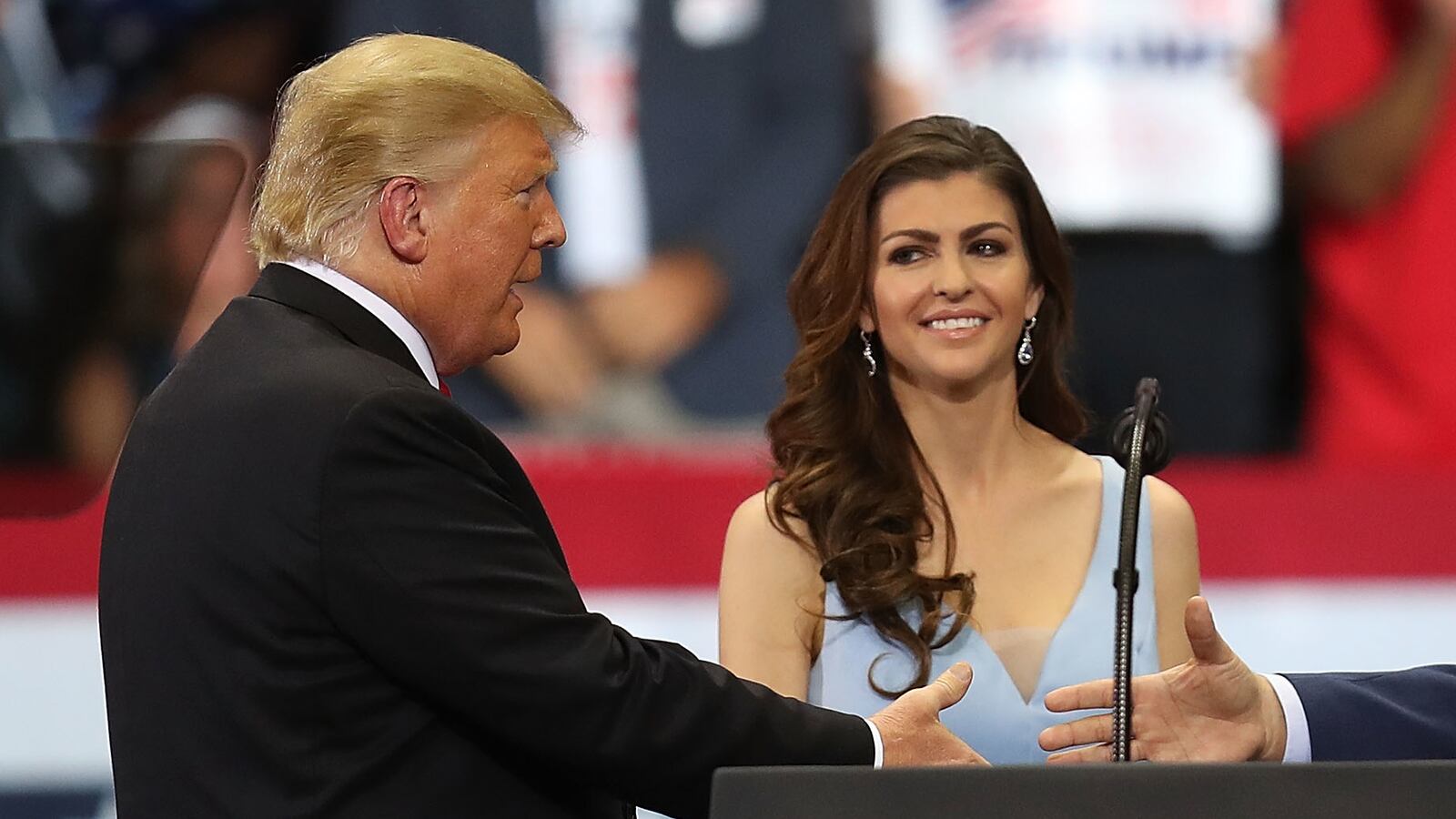 President Donald Trump greets Florida Republican gubernatorial candidate Ron DeSantis as his wife, Casey DeSantis.