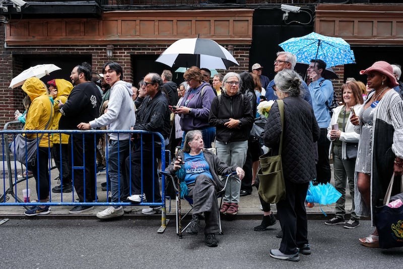People wait by the stage door of the Ed Sullivan Theater before the taping of the final episode of the "The Late Show" with Stephen Colbert, in New York City, U.S., May 21, 2026.
