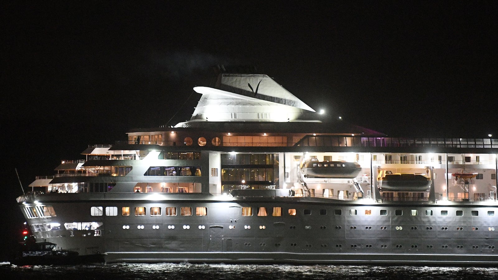 The Villa Vie Residences' Odyssey cruise ship sails at night.