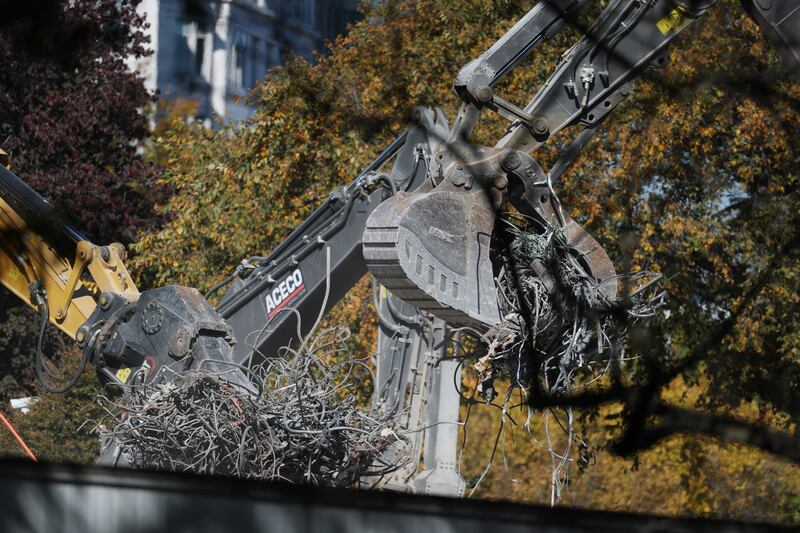 WASHINGTON, DC - OCTOBER 27: An excavator clears rubble and twisted metal at the site of where the East Wing of the White House stood on October 27, 2025 in Washington, DC. The demolition began last week and is a part of U.S. President Donald Trump's plan to build a multimillion-dollar ballroom on the eastern side of the White House. (Photo by Anna Moneymaker/Getty Images)