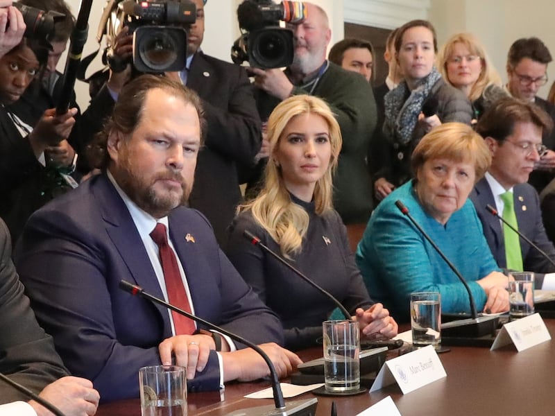 German Chancellor Angela Merkel and US President Donald Trump meet each other with their delegations at the White House in Washington, US, 17 March 2017. From left: Siemens boss Joe Kaeser, Trump's economic advisor Gary Cohn, Salesforce CEO Marc Benioff, Ivanka Trump and Angela Merkel. Photo: Michael Kappeler/dpa | usage worldwide (Photo by Michael Kappeler/picture alliance via Getty Images)