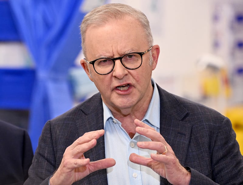Australia's Prime Minister Anthony Albanese speaks during a press conference after the opening of a medical centre in the Melbourne suburb of Coburg on March 21, 2026. Albanese answered questions relating to the fuel crisis and comments by US President Trump. (Photo by William WEST / AFP via Getty Images)