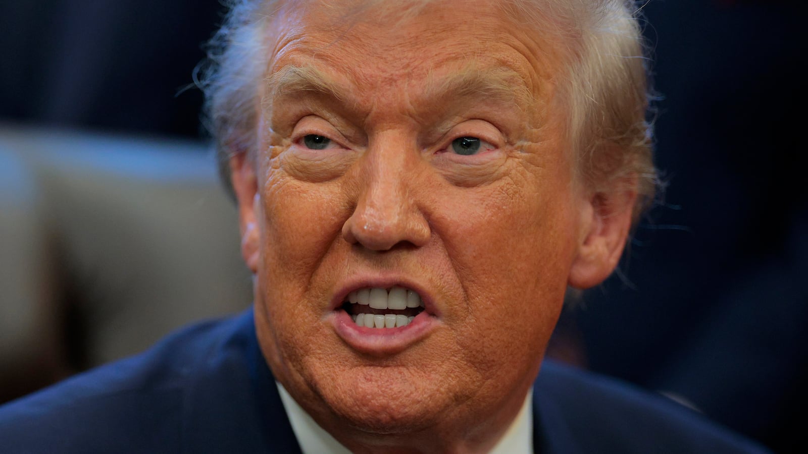 WASHINGTON, DC - DECEMBER 03: U.S. President Donald Trump speaks after announcing changes to the country's fuel economy standards in the Oval Office at the White House on December 03, 2025 in Washington, DC. Joined by executives from major automobile makers, Trump announced weaker fuel efficiency standards as part of his agenda to lower the price of gasoline-powered cars and dismantle former President Joe Biden's policies that promoted electric vehicles. (Photo by Chip Somodevilla/Getty Images)