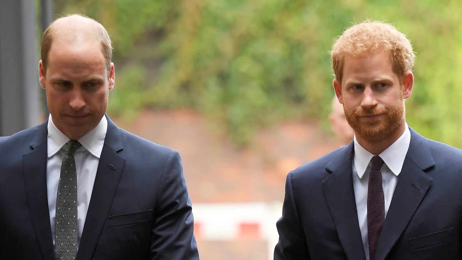 Prince William, left, and Prince Harry arrive to visit the Support4Grenfell Community Hub in London, September 5, 2017.