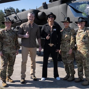 Hegseth and Kid Rock with Apache pilots.
