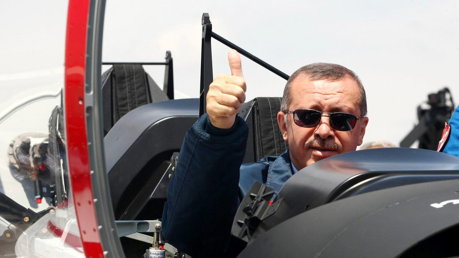 articles/2014/03/24/turkish-pm-accused-of-playing-war-games-ahead-of-elecion/140323-turkey-jet-tease_ahyjd2