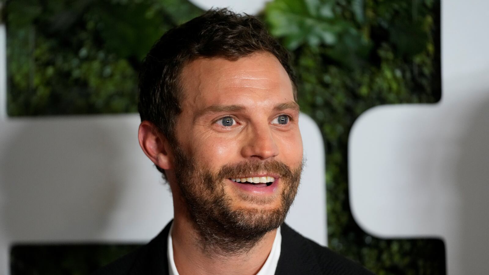 Jamie Dornan was hospitalized after coming into contact with pine processionary moth caterpillars, according to a friend.