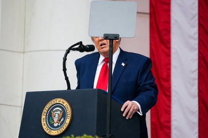 President Donald Trump delivers remarks during a Memorial Day event at Arlington National Cemetery on May 25, 2026.