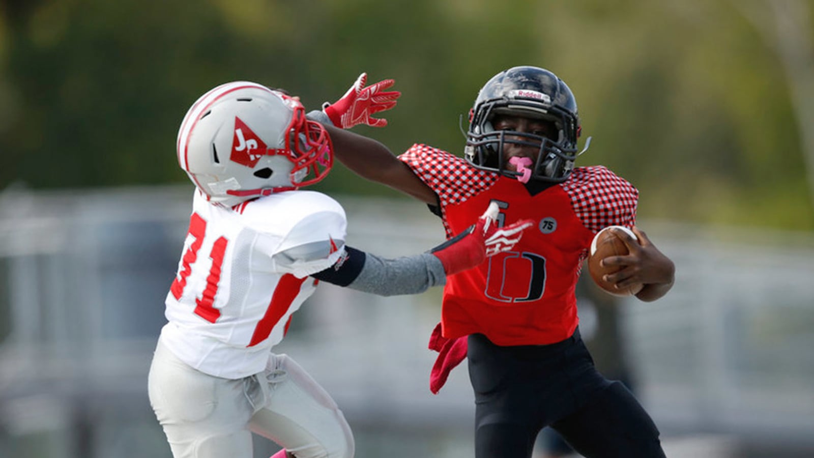 articles/2015/01/30/football-is-ruining-kids-brains/150129-veeravagu-football-tease_febhvx