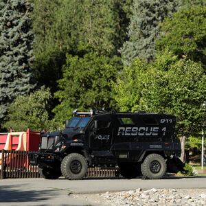 Armored law enforcement vehicles are seen at Cherry Hill Park after multiple firefighters were attacked when responding to a fire in the Canfield Mountain area outside Coeur d'Alene, Idaho, U.S. June 29, 2025.