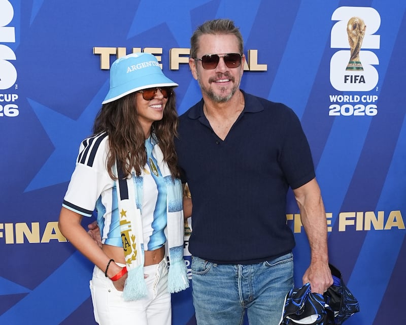 Luciana Barroso and Matt Damon pose for cameras at the FIFA World Cup 2026 Final Red Carpet.