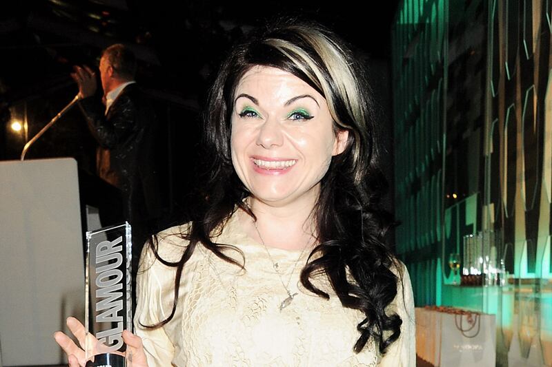 articles/2012/07/17/caitlin-moran-on-slut-walks-feminism-and-being-the-british-tina-fey/caitlin-moran-q-a-ellison_f9zwyk