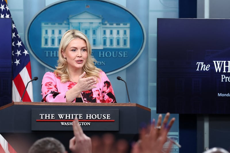 Reporters raise hands as White House Press Secretary Karoline Leavitt holds a press briefing in the James S. Brady Press Briefing Room at the White House in Washington, D.C., U.S., March 30, 2026. REUTERS/Kevin Lamarque