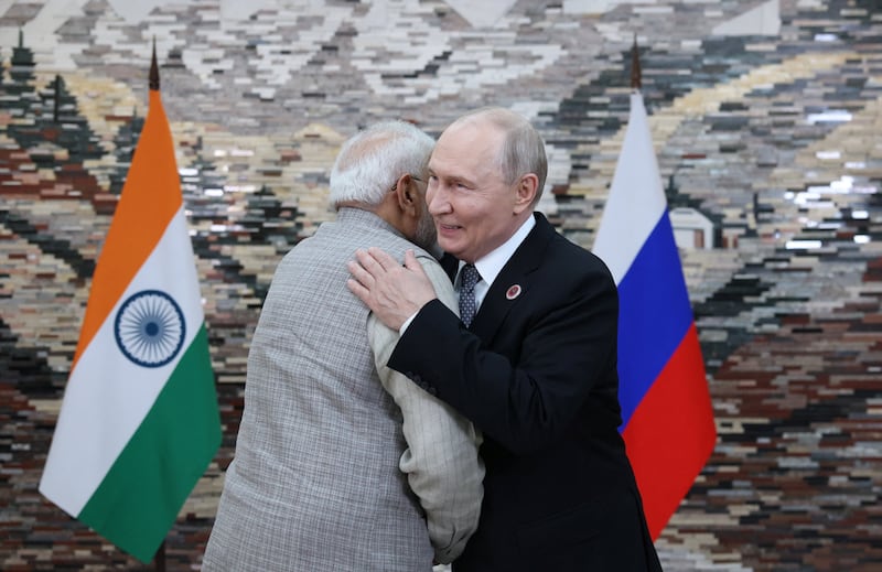 Russian President Vladimir Putin and Indian Prime Minister Narendra Modi embrace during a meeting on the sidelines of the Shanghai Cooperation Organisation summit in Bishkek, Kyrgyzstan, August 31, 2026. Sputnik/Pyotr Kovalyov/Pool via REUTERS ATTENTION EDITORS - THIS IMAGE WAS PROVIDED BY A THIRD PARTY.