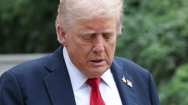 WASHINGTON, DC - SEPTEMBER 30: U.S. President Donald Trump walks toward members of the media before answering questions while departing the White House on September 30, 2025 in Washington, DC. President Trump is traveling to Marine Corps Base Quantico to deliver remarks to senior military leaders. (Photo by Win McNamee/Getty Images)