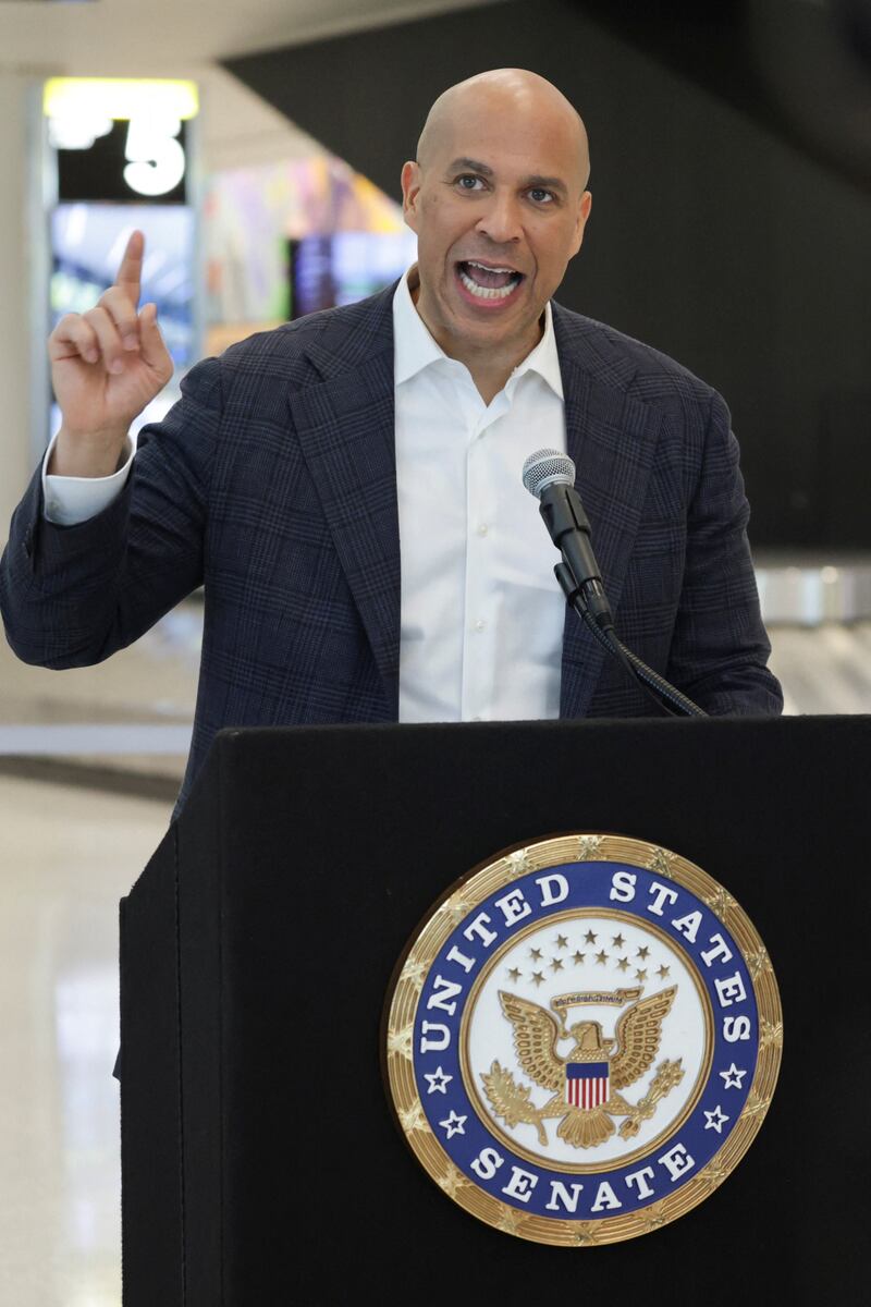 U.S. Senator Cory Booker (D-NJ) speaks at Newark Liberty International Airport, as hundreds of agents were ordered to deploy to airports to help fill TSA staffing gaps, in Newark, New Jersey, U.S., March 23, 2026. REUTERS/Jeenah Moon