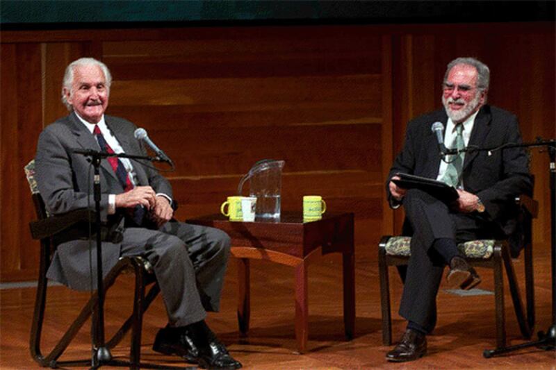 articles/2012/05/15/my-father-sergio-munoz-bata-s-friendship-with-novelist-carlos-fuentes/fuentes-munoz-together-library-cheat_z5uwb6