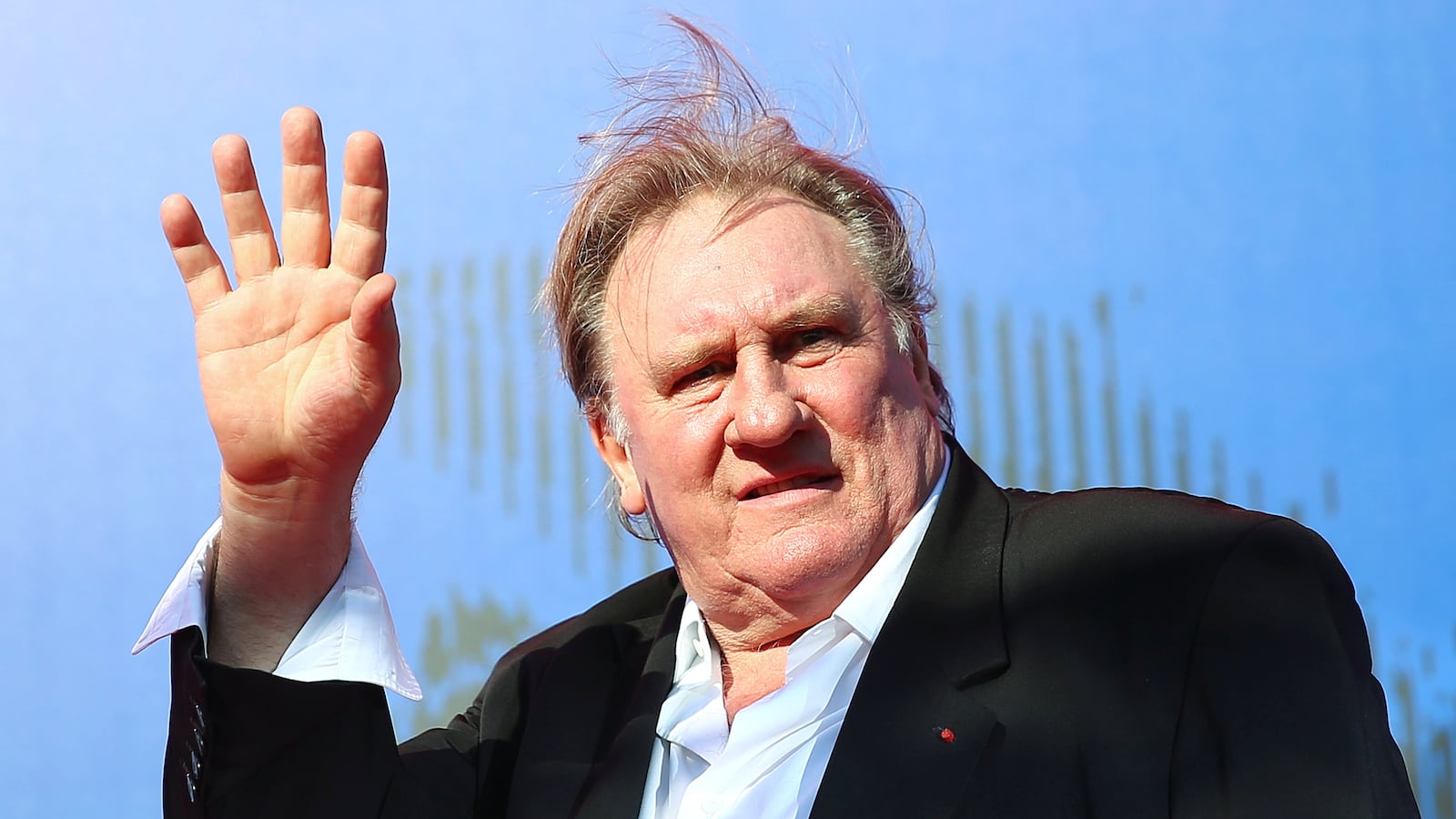 Gerard Depardieu waves as he arrives at the 74th Venice Film Festival in Venice, Italy, Italy September 5, 2017.