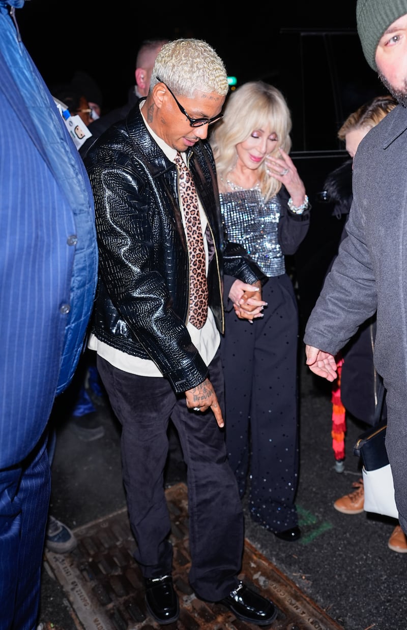 Alexander Edwards and Cher are seen arriving to the Saturday Night Live Afterparty on December 21, 2025 in New York City.