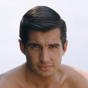 George Hamilton in a bare-chested portrait circa 1964.