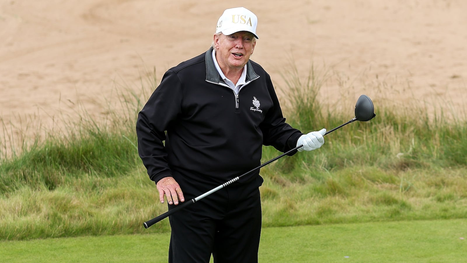 BALMEDIE,SCOTLAND - JULY 29: U.S. President Donald Trump tees off after opening his new golf course at his Trump International Golf links resort on July 29, 2025 in Balmedie, Scotland. U.S. President Donald Trump is visiting his Trump Turnberry golf course, as well as Trump International Golf Links in Aberdeenshire, during a brief visit to Scotland from July 25 to 29. (Photo by Jeff J Mitchell/Getty Images)