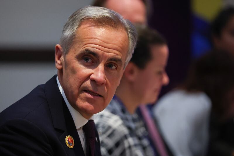 Canada's Prime Minister Mark Carney speaks during a bilateral meeting with Malaysia's Prime Minister Anwar Ibrahim on the sidelines of the 47th Association of Southeast Asian Nations (ASEAN) Summit in Kuala Lumpur on October 27,