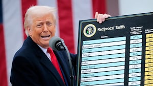 President Donald Trump holding up his tariff chart on what he called “Liberation Day” on April 2 as he has moved to impose sweeping tariffs on countries around the world since taking office.