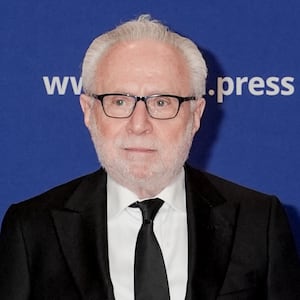 Wolf Blitzer poses on the red carpet upon arrival for the annual White House Correspondents' Association (WHCA) Dinner in Washington, D.C., U.S., April 26, 2025. REUTERS/Ken Cedeno