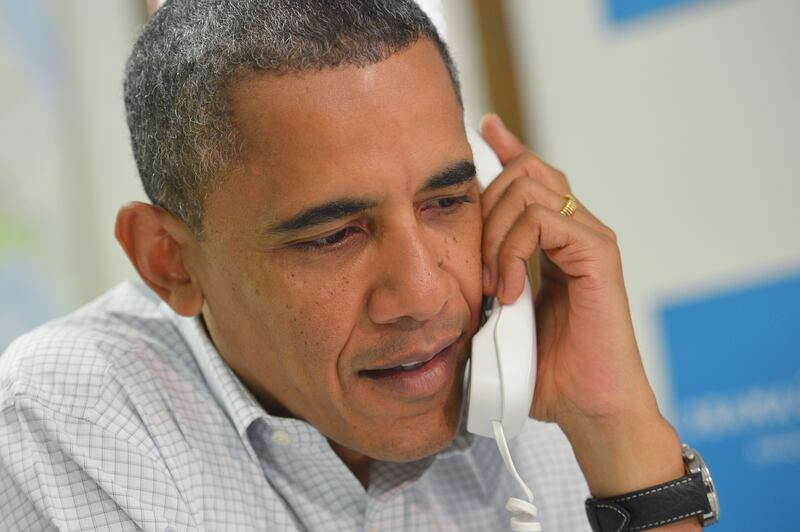 articles/2012/12/19/time-s-man-of-the-year-shockingly-is-president-obama/obama-phone_pklm2g