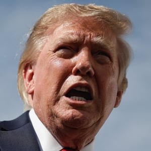U.S. President Donald Trump gestures as he speaks to the media before boarding Air Force One at Joint Base Andrews in Maryland, U.S., en route to Myrtle Beach, South Carolina, August 21, 2026. REUTERS/Evan Vucci