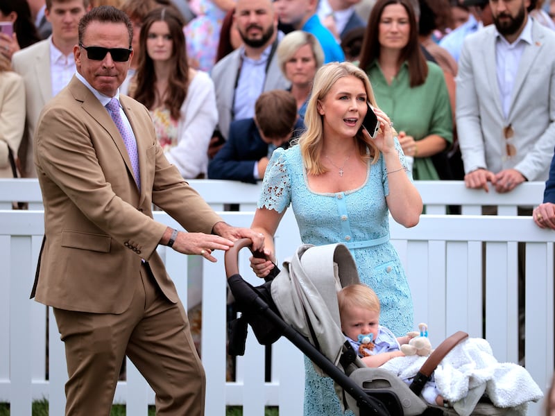 WASHINGTON, DC - APRIL 21: White House Press Secretary Karoline Leavitt and her husband Nicholas Riccio arrive to the White House Easter Egg Roll on the South Lawn of the White House on April 21, 2025 in Washington, DC. The White House said they are expecting thousands of children and adults to participate in the annual tradition of rolling colored eggs down the White House lawn, a tradition started by President Rutherford B. Hayes in 1878. (Photo by Chip Somodevilla/Getty Images)