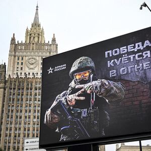 Russian Foreign Ministry building is seen behind a social advertisement billboard showing Z letters - a tactical insignia of Russian troops in Ukraine