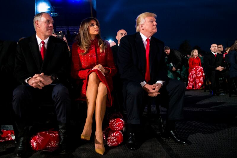 President Donald Trump, first lady Melania Trump, and then-Interior Secretary Ryan Zinke participate in the 95th annual national Christmas tree lighting ceremony in 2017.