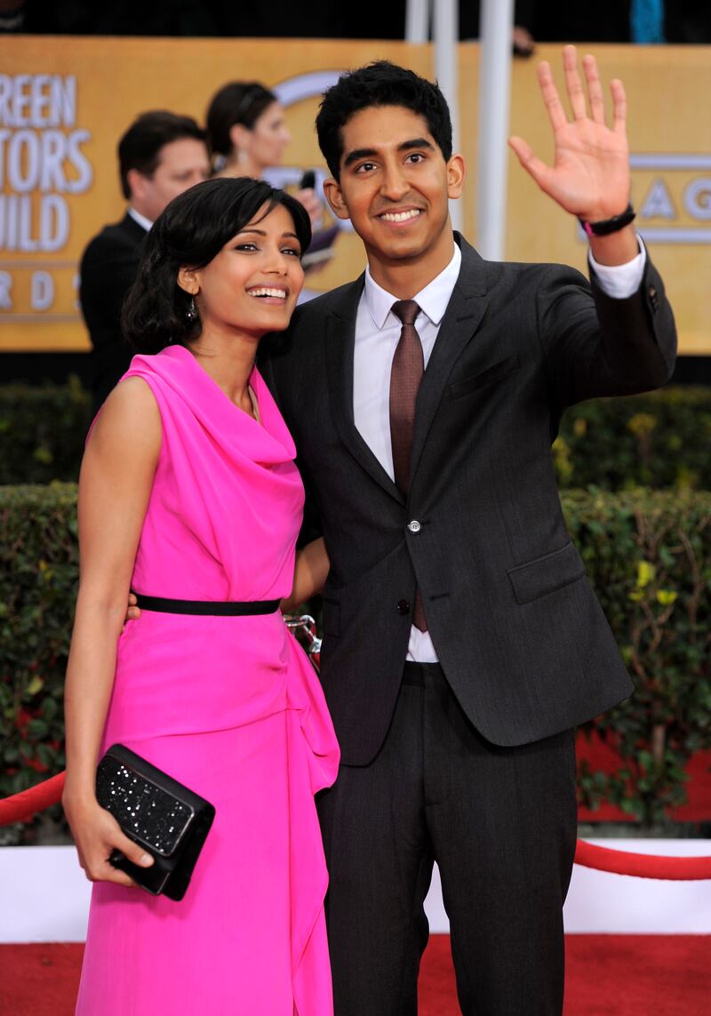 galleries/2013/01/27/best-dressed-on-the-red-carpet-at-the-sag-awards-2013-photos/SAG-Freida-Pinto-Dev-Patel_k9vk6a