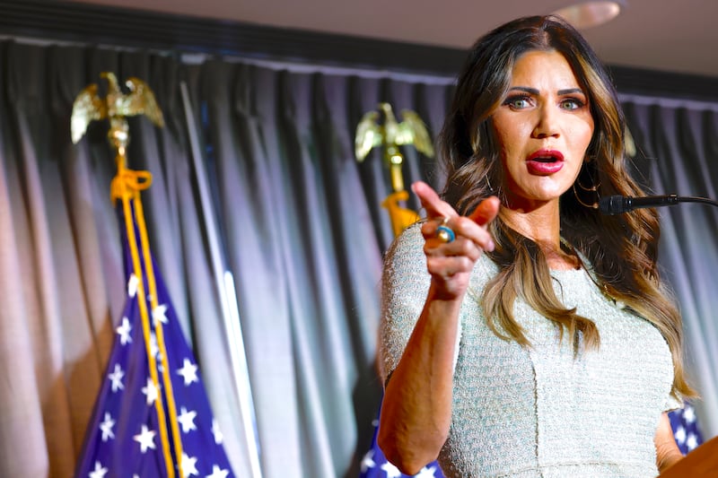 Kristi Noem gestures as she speaks at the Calvin Coolidge Foundation conference at the Library of Congress on February 17, 2023 in Washington, DC.