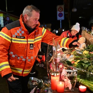 CRANS-MONTANA, SWITZERLAND - JANUARY 1: (EDITOR'S NOTE: This Handout image was provided by a third-party organization and may not adhere to Getty Images' editorial policy.) In this screenshot from a video provided by the Valais Cantonal Police, emergency workers respond to a scene where a fire broke out overnight at Le Constellation bar on January 1, 2026 in Crans-Montana, Switzerland. According to authorities, the fire began around 1:30 AM local time. As of later that morning, authorities were reporting that several dozen people had died. (Handout photo by Valais Cantonal Police via Getty Images)