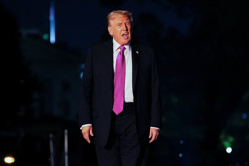 U.S. President Donald Trump gives brief remarks to the media as he arrives at the White House in Washington, D.C., U.S., September 14, 2025. REUTERS/Aaron Schwartz  REFILE - QUALITY REPEAT