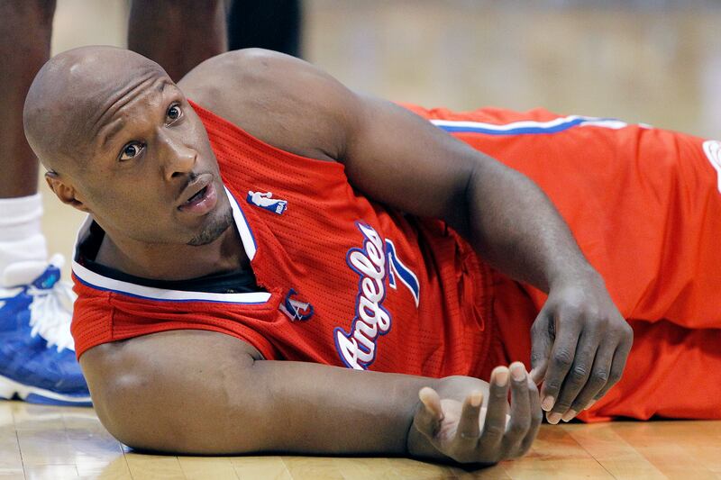 galleries/2013/12/20/biggest-celebrity-scandals-of-2013-miley-twerks-beyonce-lip-syncs-and-more/2013-celeb-scandal-odom_cyd6ls