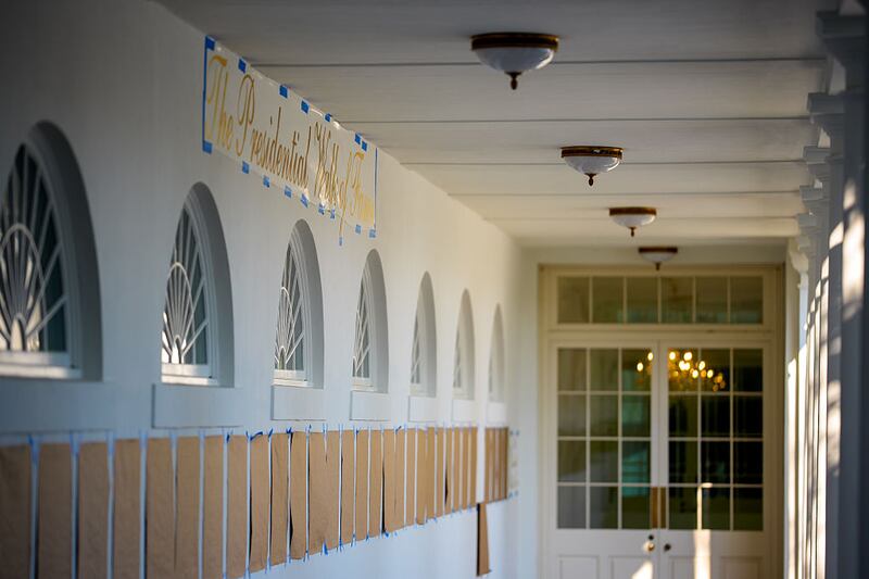 WASHINGTON, DC - SEPTEMBER 19: The words "The Presidential Walk of Fame" is written above brown paper taped along the wall of the colonnade outside of the Oval Office at the White House on September 19, 2025 in Washington, DC. Trump signed two executive orders, establishing the "Trump Gold Card" and introducing a $100,000 fee for H-1B visas. The "Trump Gold Card" is a visa program that allows foreign nationals permanent residency and a pathway to U.S. citizenship for a $1 million investment in the United States. (Photo by Andrew Harnik/Getty Images)