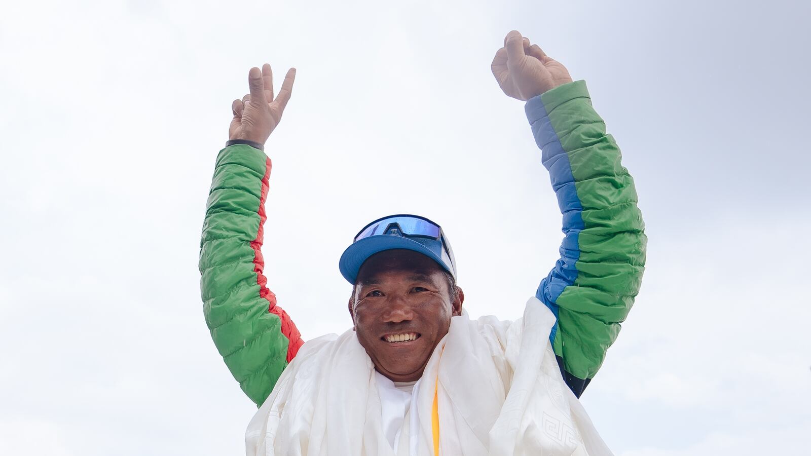 KATHMANDU, NEPAL - 2024/05/24: Legendary Mountaineer Kami Rita Sherpa waves at people as he arrives after scaling Mt Everest for the 30th time, leading the world record of most ascents on the world's highest peak Mount Everest at Tribhuvan International Airport. Kami Rita Sherpa, considered one of the greatest mountain guides, reached the 8,849-meter (29,032-foot) summit at 7:49 AM local time on Wednesday 22 May, 2024 according to expedition organizer Seven Summits Treks. (Photo by Prabin Ranabhat/SOPA Images/LightRocket via Getty Images)