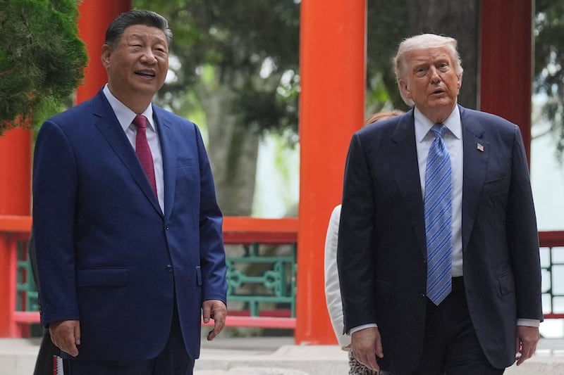 Trump talks with Xi at the Zhongnanhai leadership compound on the last day of their meeting.