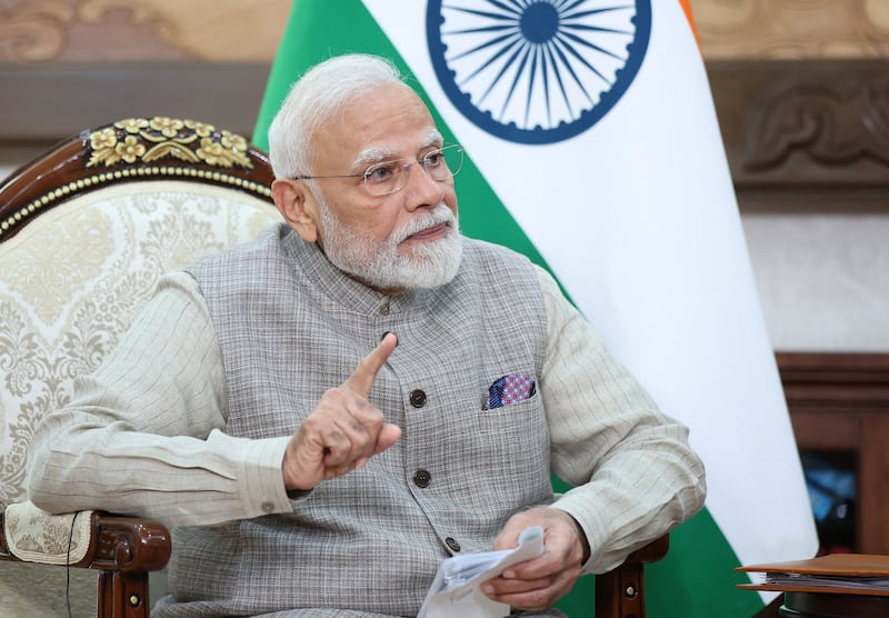 Indian Prime Minister Narendra Modi speaks with Russian President Vladimir Putin during a meeting on the sidelines of the Shanghai Cooperation Organisation summit in Bishkek, Kyrgyzstan, August 31, 2026. Sputnik/Pyotr Kovalyov/Pool via REUTERS ATTENTION EDITORS - THIS IMAGE WAS PROVIDED BY A THIRD PARTY.