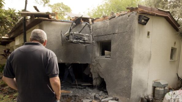 articles/2012/11/02/war-and-elections/rocket-gaza-openz_t5dfx0